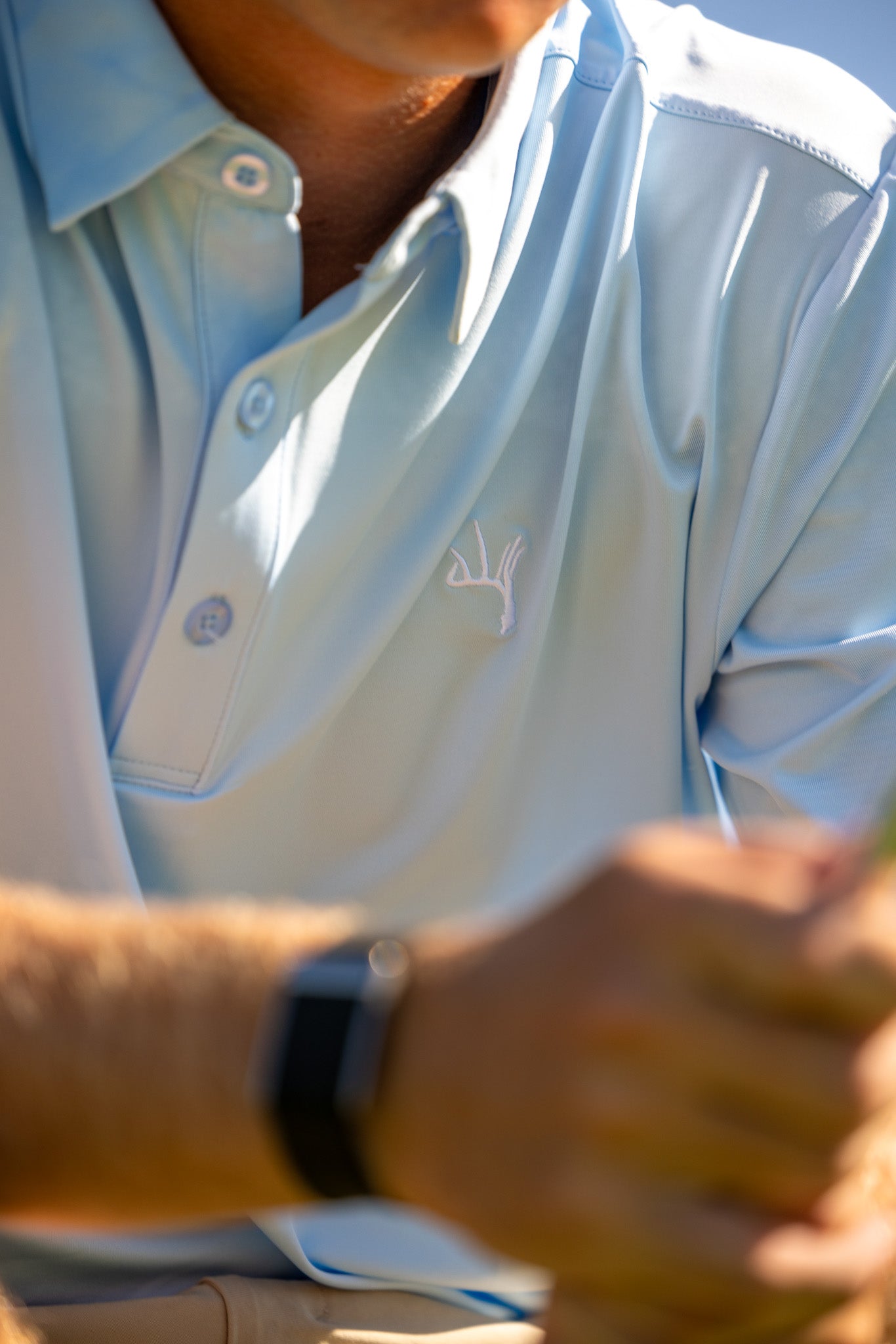 The Baby Blue Buck Polo